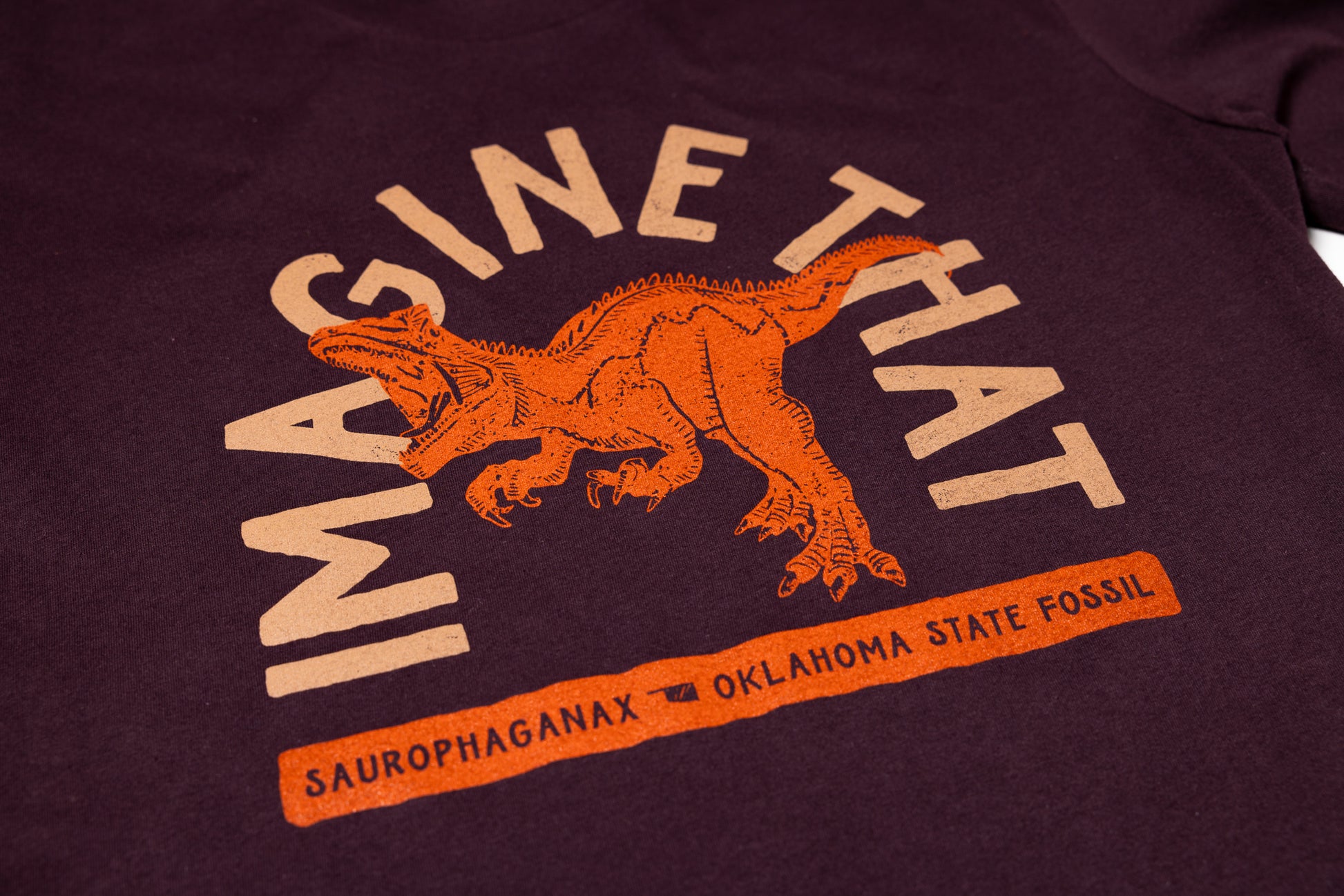 Imagine That Oklahoma Dino T-Shirt Oxblood Logo